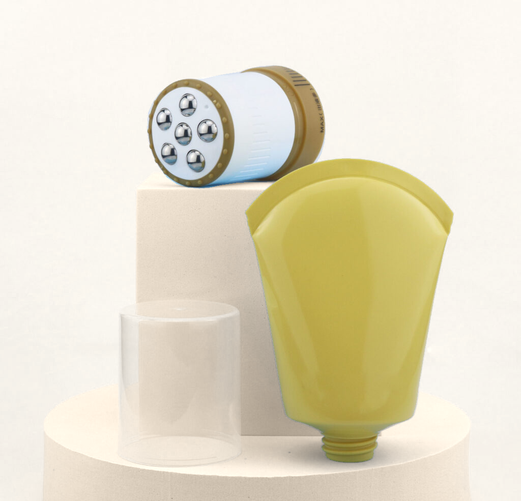 Yellow massage tube shown with a multi-ball applicator head